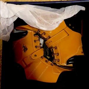 A pair of U.S. polo ASSOCIATION boots